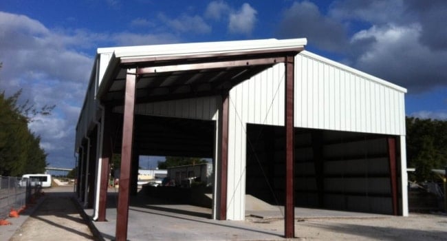 partially open metal building with single slope canopy