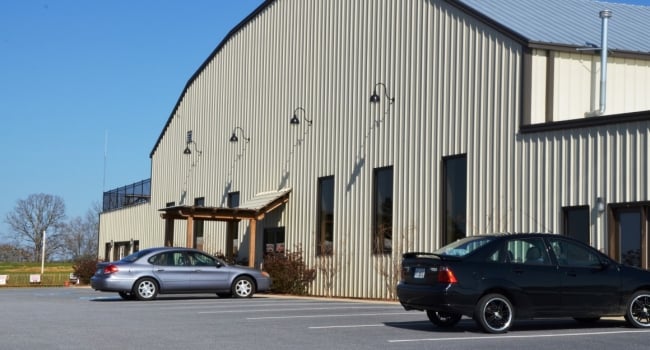 gambrel roof airplane hangar with leantos