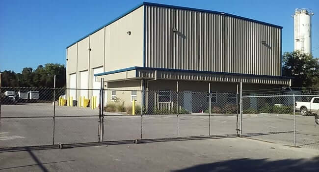 metal building warehouse with wrap around decorative canopy