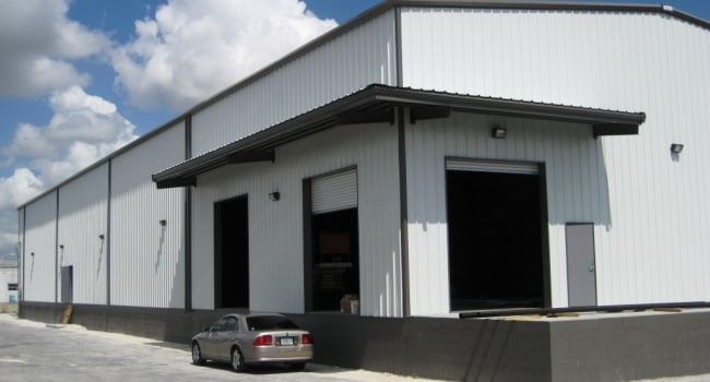 metal warehouse with loading dock and canopy