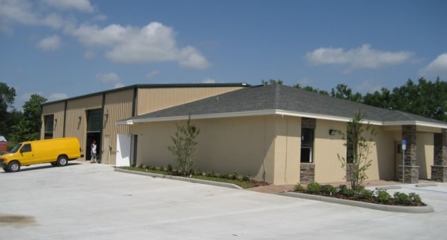 metal building warehouse attached to traditional block office