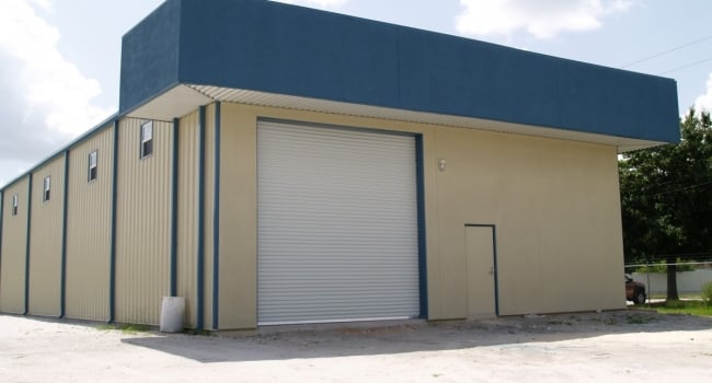 metal building warehouse with decorative mansard