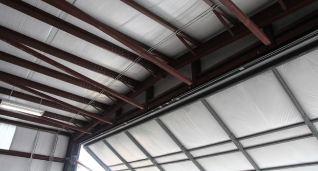 metal building frame kickbacks for hydraulic door