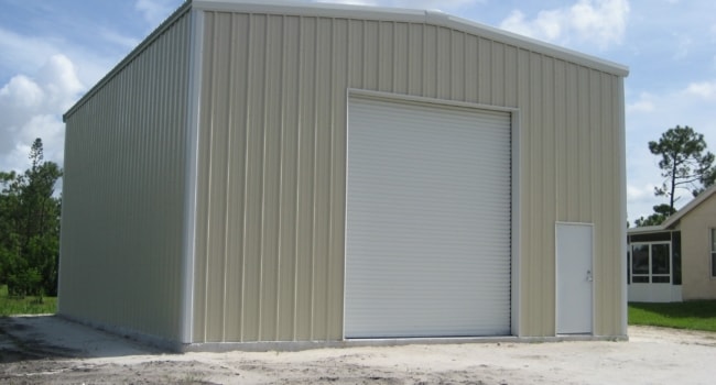 metal riding arena with canopy and purlin extensions