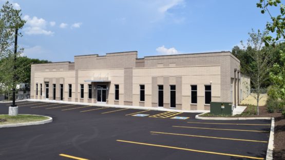 Commercial steel building with brick front for office, retail showroom, and warehouse.
