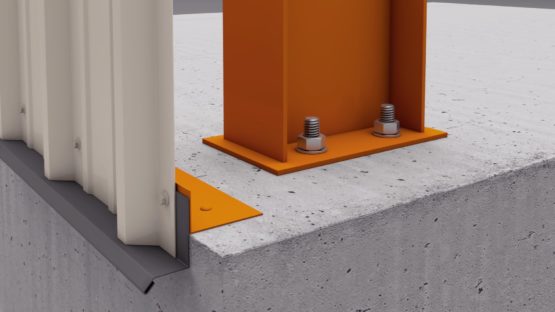 Metal building base angle with flashing, PBR panel attached, on sample section concrete slab.